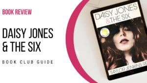 Book cover of Daisy Jones & The Six by Taylor Jenkins Reid placed on a table